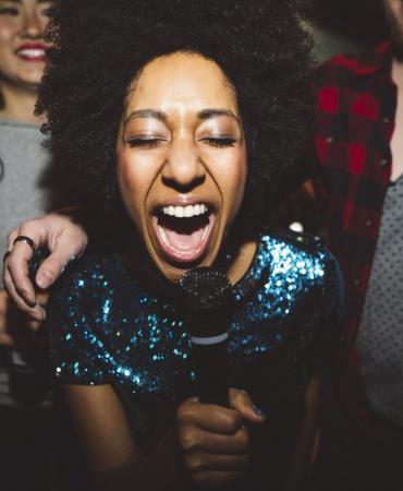 woman singing karaoke