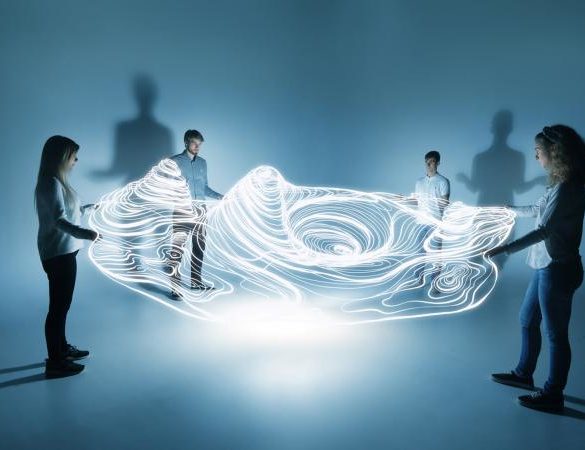 people holding a lighttrace carpet