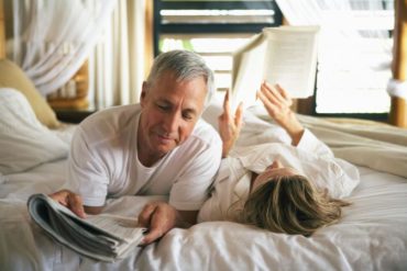 Senior couple reading together