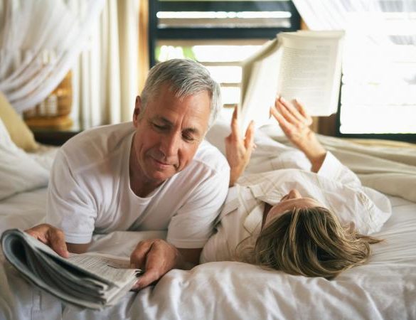 Senior couple reading together