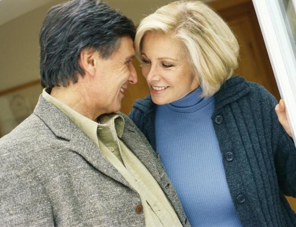 Senior couple, heads close together