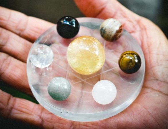 Hand Holding Gemstones