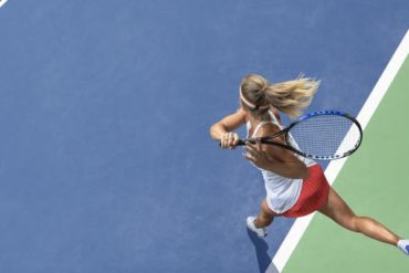 competitive woman playing tennis