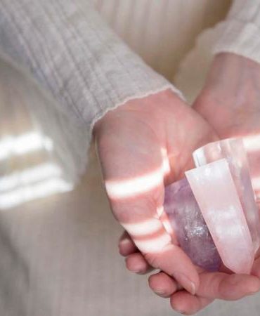 woman holding crystals