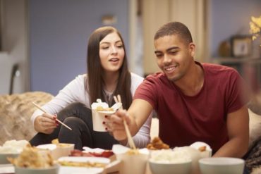 couple eating Chinese takeout