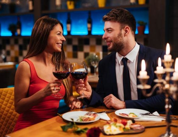 Woman and man enjoying a romantic dinner
