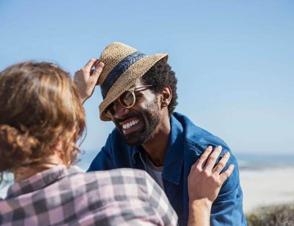 Playful couple at the beach