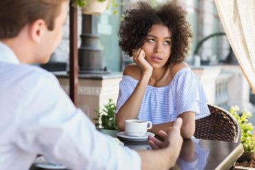 woman disinterested with date