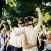 Newlywed brides excited at end of ceremony