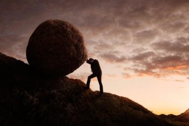 Pushing boulder uphill