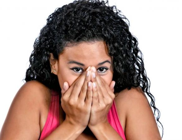 Embarrassed young woman