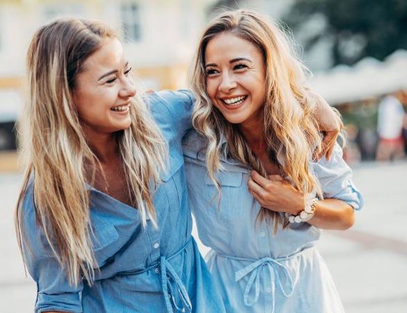 Happy twins in the city