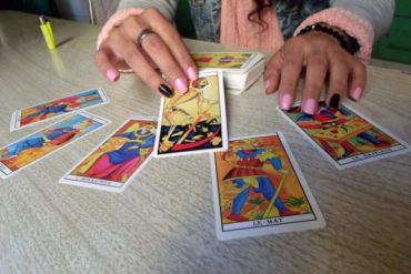 woman with tarot spread