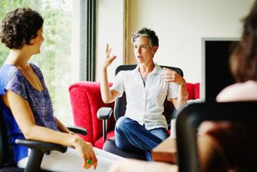 Woman leading meeting