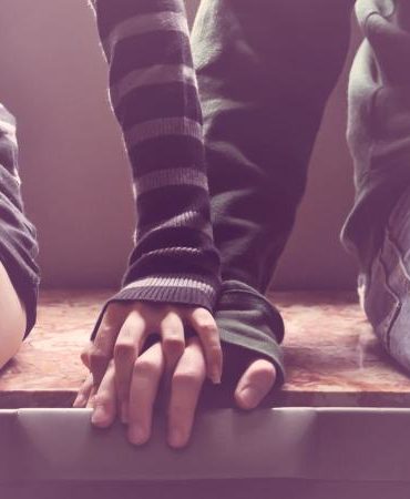 couple holding hands