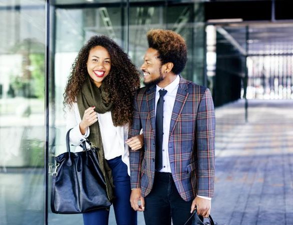 Well-dressed couple smiling