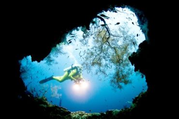 Deep sea diver in a cave