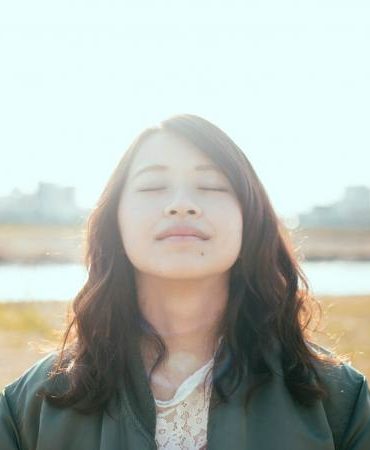 Girl closing her eyes