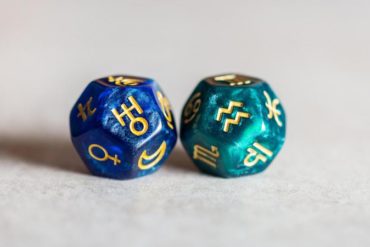 Dice with Aquarius and Uranus Glyph