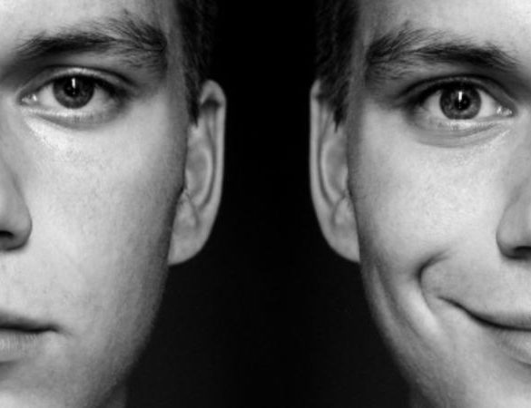 Two opposite half faces of a man
