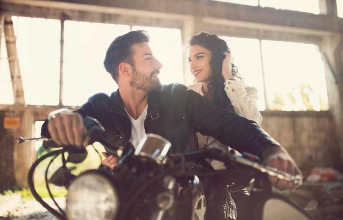 Woman and Man on motorcycle