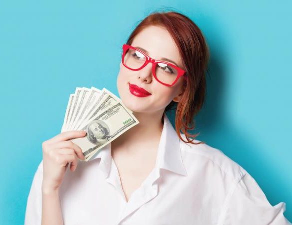 beautiful young woman with money